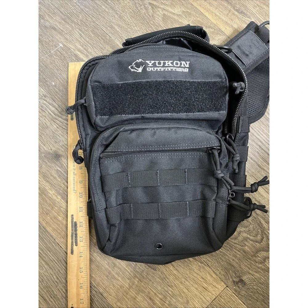 YUKON OUTFITTERS Men's Black Sling Bag (Single Strap) Pockets Backpack
